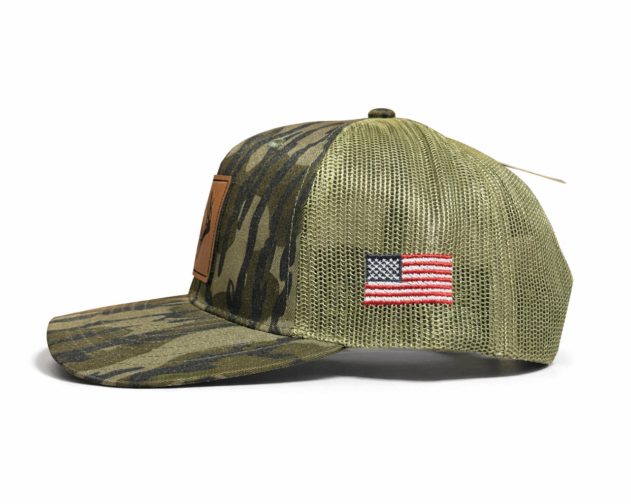 Camouflage baseball cap with American flag patch on a white background